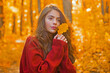 © Volodymyr - Portrait of woman with autumn leaf on face. Woman portrait close up on autumn background. Woman face with autumn leaves. Beauty girl in autumn fall leaves park. Girl autumnal mood. Foliage, falling