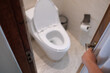 © waranyu - open the bathroom door, go to toilet