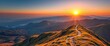 © DITSARAPHAN - Sunrise over mountain range, path winding upward,  destination,  sunrise