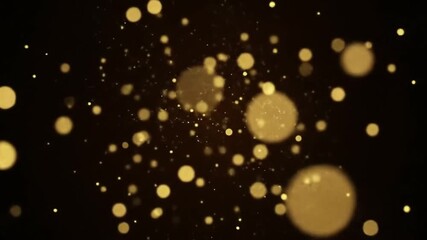 Golden luxury bokeh with dust and glitter particles floating on black background. Elegant shimmer effect with screen blending mode. Seamless loop animation for festive or upscale visuals