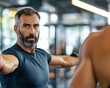 © Aimage - Sweaty Bearded Man Demonstrating Correct Posture in a Gym
