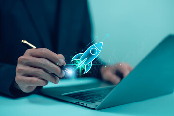  Startup business start-up with technology background as a rocket image conveying the idea of ​​launching a well-planned new business.	
  
