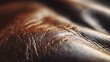 © Punpawee - Leather Texture: A detailed view of supple, textured leather, revealing the intricate patterns and rich, natural beauty of the material.