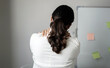 © Orathai - Woman having shoulder pain pain during work long time. stretching to relax and relax while working hard at the office