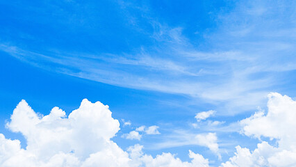 Wall Mural - Bright white cumulus clouds floating in a clear blue summer sky. Blue sky with clouds. Soft white clouds float in the clear blue sky. Clear blue sky, bright spring, wallpaper landscape.