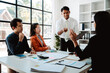 © Dino - Business handshake concept. Illustration of business people working together. Successful deal after a good meeting. Brainstorming of young modern group. Team meeting to achieve goal. Business people