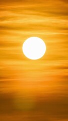 Wall Mural - Timelapse of dramatic sunrise with orange sky in a cloudy day.