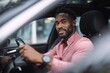 © ttonaorh - Attractive male driver in business shirt looking forward while seated in a car, symbolizing travel, independence, and lifestyle.