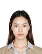© Oleksandr - Biometric passport photo of attractive young Asian woman with natural healthy skin. Professional studio portrait features a friendly, confident expression against a clean white background.