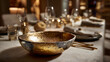 © Jiajia - Elegant table setting with gold centerpiece bowl and soft ambient lighting