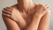 © busra - Woman applying body cream on arm, beauty skin care concept
