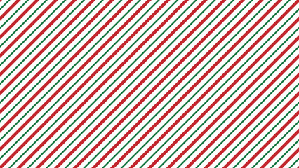 Wall Mural - Christmas seamless pattern in classic candy cane design with red and green diagonal stripes on transparent background with 16x9 aspect ratio.