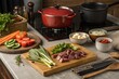 © Srey - Delicious fondue preparation with fresh ingredients and cooking equipment on a kitchen counter
