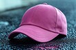 © Oleksandr - Mockup graphic layout featuring a pink cap on a textured surface