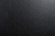 © Lem - Dark, textured surface.  Close-up view of a smooth,  dark,  slate-like material with subtle,  fine grooves