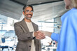 © insta_photos - Happy mature business man recruiter hr manager and new employee handshake at job interview. Smiling professional executive advisor and bank client shake hands standing at corporate office meeting.