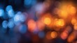 © Johannes - Soft, colorful bokeh lights in blue and orange blur together, enhancing the festive atmosphere of a night event