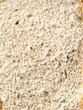 © LUBO - Close-up of white wheat bread slice texture.