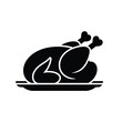 © ariyan - Black silhouette of a roasted whole chicken on a serving platter