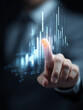 © Sai Tunyee - Businessman hand touch glowing touchscreen interface activating virtual icon digital chart bar graph.