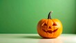 © Prap - Halloween pumpkin on green background (1)