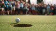 © Punnn - Golf ball and hole: A golf ball drops triumphantly into the hole on a lush green course, cheered on by a crowd of enthusiastic spectators, showcasing the thrill of a successful shot.