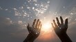 © azi - Two hands reaching up toward the sky, connections above, sunset is visible, clouds