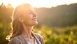 © rio - Relaxed woman enjoying nature's light