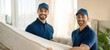 © Gura - The professional movers smiling while delivering a mattress into a modern home