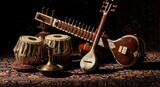 Indian musical instruments, including a sitar and tabla, arranged on a patterned rug.