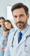 © Inspire Shots Hub - Close-up of male doctor in white coat, stethoscope, and tie, with blurred family in background, conveying care, trust, and medical expertise