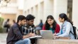 © N7 - Indian University Learners Engaged in Team Discussion with Blurred Background