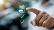 © Furkan - Businessman Touching Car, File and Checkmark Icons Representing Auto Insurance Approval, Vehicle Sales Agreement and Corporate Documentation