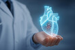 © waakik - Doctor holding holographic 3d human heart for futuristic medical analysis
