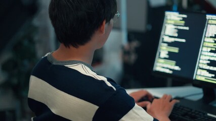 Programmer typing code debugging software development system logic backend programming dual monitors task function interface