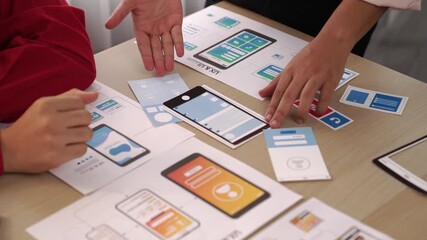 Wall Mural - panorama video of startup company employee planning on user interface prototype for mobile applicati