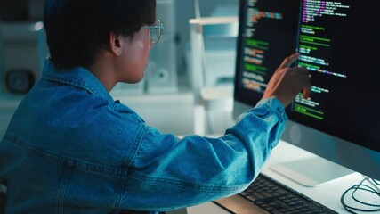 Software developer focused on debugging code multi screen programming task system development project
