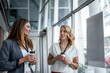 © Migma_Agency - Businesswomen talking during coffee break at conference