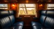 © Rastika - Vintage train cabin interior with blue leather seats and scenic window view