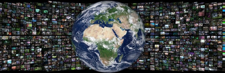 Wall Mural - a large screen with many images of people and a globe