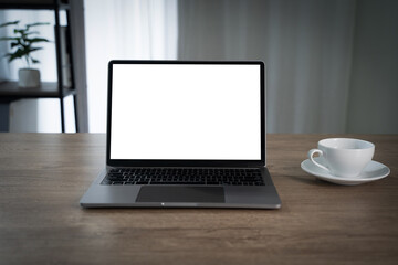 Wall Mural - laptop with blank screen on table. workspace background new project on laptop computer with blank co