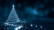 © Parol - A christmas tree made of lights on a dark blue background with bokeh and a star on top shining brightly