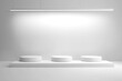 © Shahida - AllWhite Studio Setup with Three Round Pedestals and Overhead Lighting Fixture