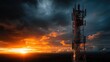© George - Climber conquers a towering cellular structure against a dramatic sunset backdrop