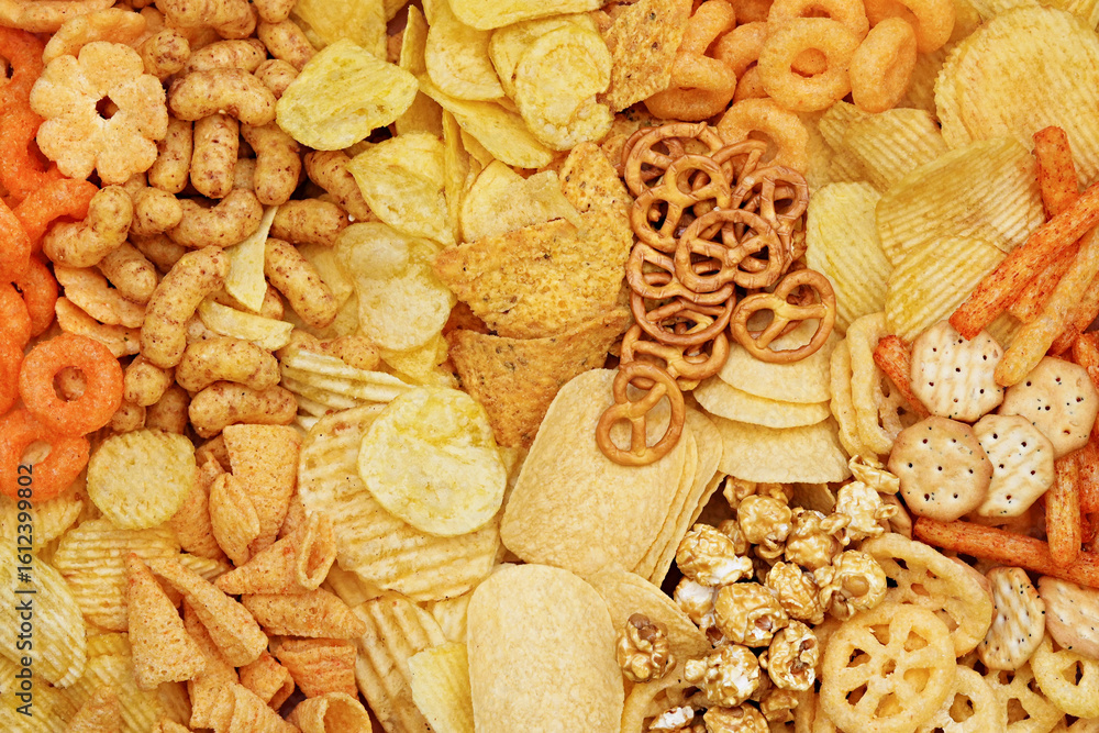 Colorful mix of salty snacks for beer varieties: chips and pretzels ...