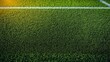 © k - Close-up view of a vibrant green artificial turf field with a white boundary line and warm sunlight casting a glow on the grass