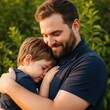 © suja - A father lovingly embraces his son during a heartwarming outdoor moment sharing a tender hug