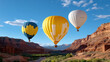 © siraphol - Colorful hot air balloons float above canyon landscape, creating serene and picturesque scene