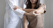© Orathai - Female physiotherapists provide assistance to woman patients with elbow injuries examine patients in rehabilitation centers. Physiotherapy concepts