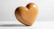 © MDTOUFICKAHAMAD - A polished wooden heart sculpture isolated on white